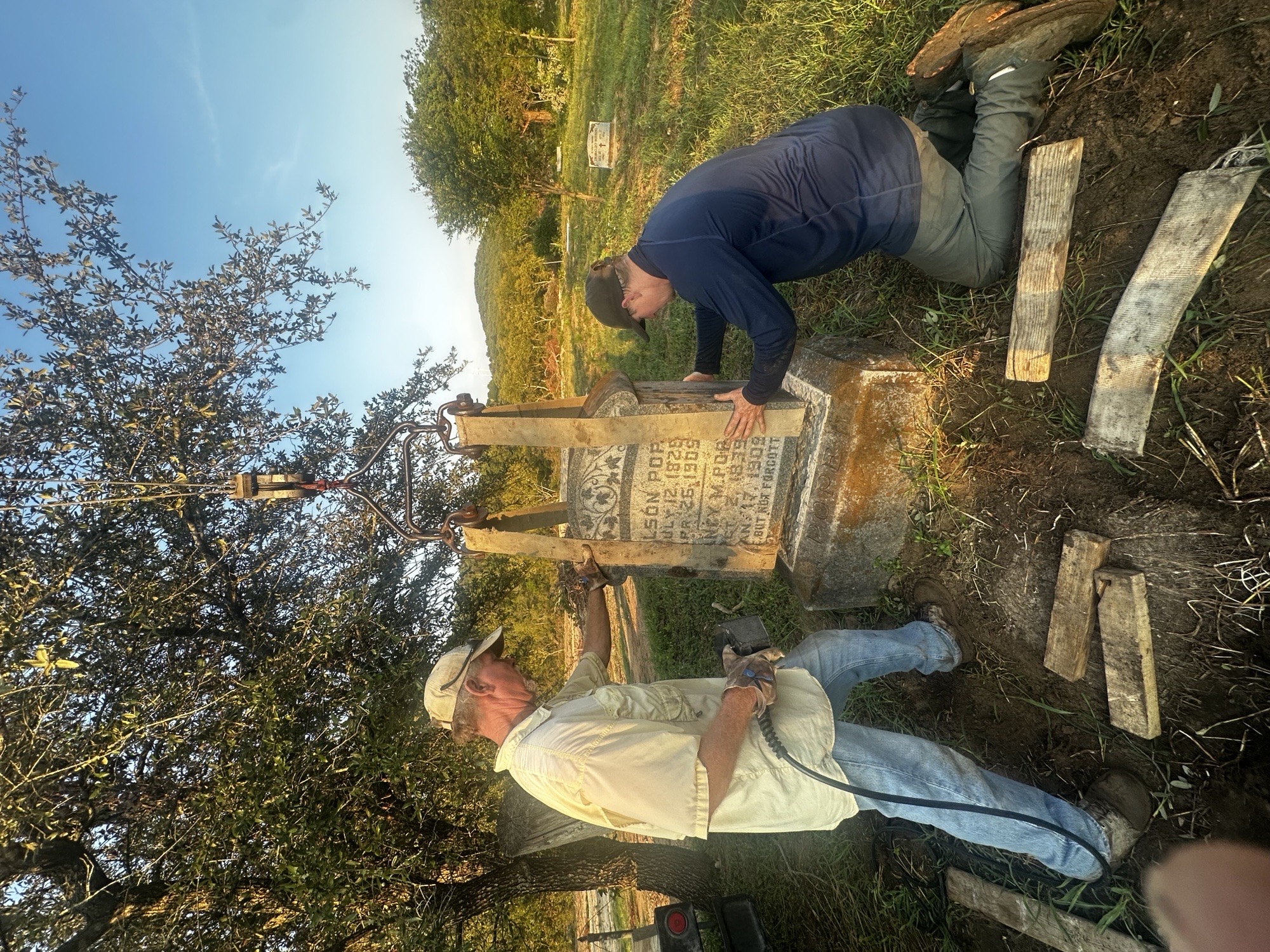 Avalon Monuments crew restoring a headstone